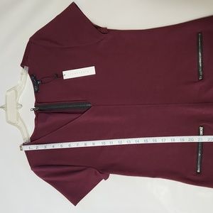 Sanctuary, classic A line, mini dress, with zipper accent pockets.